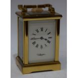 A 20th century Wellington brass carriage clock, bevelled glass,