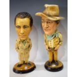 A plaster cast figure, John Wayne, 45cm high; another Humphrey Bogart,
