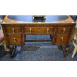 An oak writing desk,