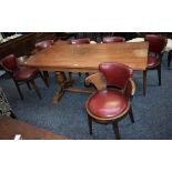 An oak refectory dining table and six chairs, by Bowman Brothers Ltd, Camden Town, London,