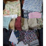 Textiles - a quantity of fabric lengths and samples, including printed cottons, floral designs,