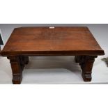A Gothic Revival pitch pine lectern, the sides pierced with a Maltese type cross,