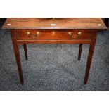 A George III oak side table, crossbanded rectangular top above a long cockbeaded frieze drawer,