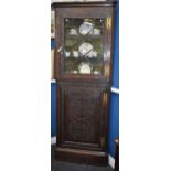 A 19th century oak floor standing corner vitrine,