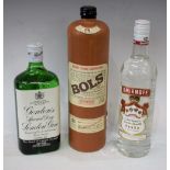 A bottle of Bols Genever, 1ltr; a bottle of Gordon's gin, 75cl; a bottle of Smirnoff vodka,