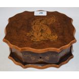 A Victorian sewing box, decorated with cherubs, ribbon ties and scrolling foliage, 20.