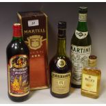 A bottle of Martell Cognac,