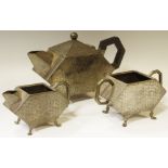 An Art Deco Tudric style pewter tea service comprising teapot,
