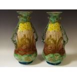 A Pair of Mintons Secessionist two handled vases, printed and painted with primroses,