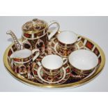 A Royal Crown Derby 1128 miniature coffee service on tray