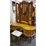 A mahogany dressing chest, oval mirror, shelf and two drawers to superstructure,
