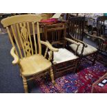 A modern beech lath back carver chair; an elm carver chair with raffia seat;