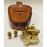 A brass sextant, marked Stanley, London,