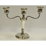 A silver three branch candelabrum