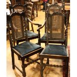 A set of four Jacobean Revival oak dining chairs,