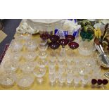 Eight Waterford finger bowls; a cranberry Bohemian glass table lamp; Waterford bowl;