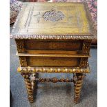 An oak work table, carved sliding top, barley twist legs and stretchers,
