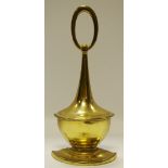 A Neo-Classical style brass urnular door stop