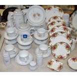A Royal Albert Old Country Roses dinner plate; four side plates; trinket dishes;
