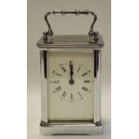 A silvered carriage clock