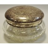 A Chinese silver topped cut glass powder jar,