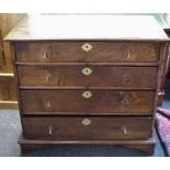 An early 19th century oak chest four graduated drawers, ogee feet, 87cm high, 97cm wide,