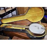 A Sage five string banjo,