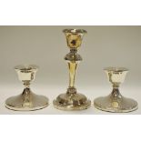 A pair of Elizabeth II silver boudoir candlesticks;