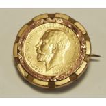 A 1913 half sovereign in 9ct gold mount (6g gross)