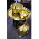 A Moorish brass tray top folding table; two jam pans;