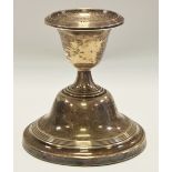 An Edwardian silver candlestick,