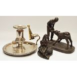 A small bronze figure of a seated ballet dancer;