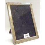 A silver rectangular easel photograph frame, marked Birks,