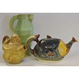 A novelty Staffordshire Majolica teapot in the form of a fish eating a smaller fish as its spout, c.