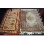 A hand woven Persian rug in tones of cobalt,