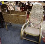 A woven wicker cot on castors;