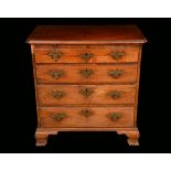 A George II mahogany bachelors chest, moulded top with re-entrant angles,