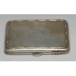 An Edwardian silver rounded rectangular aide-memoire,
