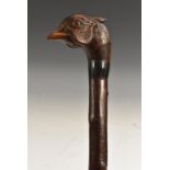 A carved blackthorn walking stick, pheasant, marked SCR,