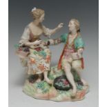 A Derby Patch Mark figure group, of a courting couple, both in fancy dress,