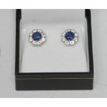 A pair of sapphire and diamond cluster earrings,