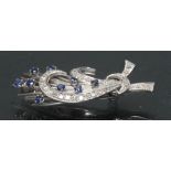 A sapphire and diamond floral spray ribbon brooch,
