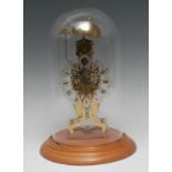 A Gothic Revival style brass skeleton clock,