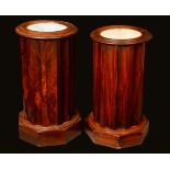 A near pair of Victorian cylindrical pot cupboards, each as a fluted column,