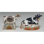 A Royal Crown Derby paperweight, Frisian Cow Buttercup, gold stopper, boxed; another, Bluebell Calf,