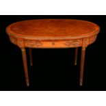 A Louis XVI Revival gilt metal mounted kingwood and rosewood oval centre table,