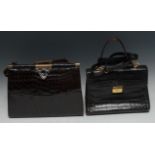 Luxury Fashion - a lady's brown crocodile lady's handbag, brass clasps, 32cm wide; another, similar,