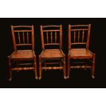 A harlequin set of six 19th century elm and ash dining chairs, turned spindle backs, panelled seats,