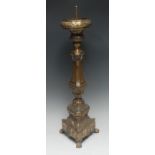 A 19th century Continental brass triform altar pricket candlestick,