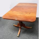 A Regency mahogany rounded rectangular twin-pillar dining table, one additional leaf, 73cm high,